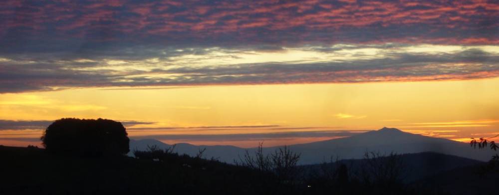 Blick von La Rogaia gen Westen bei Sonnenuntergang